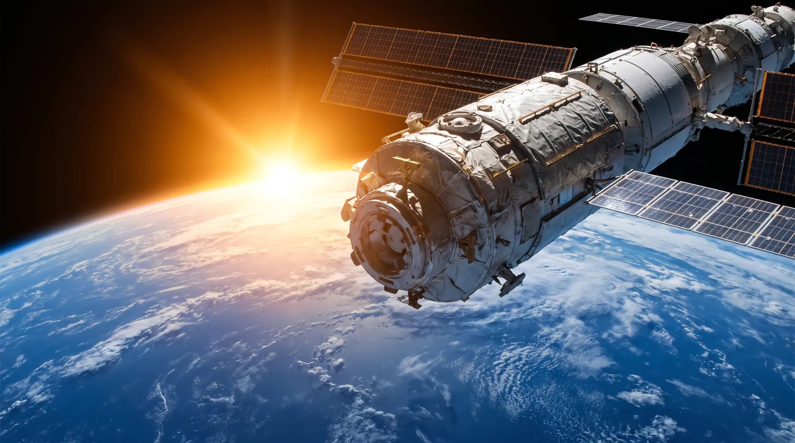 Hard science fiction shot of a Chinese space station module orbiting above the Pacific at sunrise, earth's curved horizon glowing, solar arrays catching light, photoreal NASA-style imagery