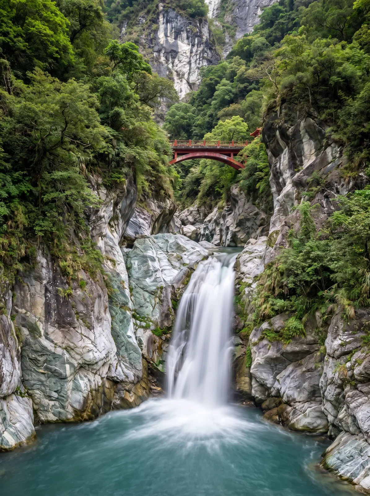 Waterfall in Taroko Gorge, Taiwan, marble cliffs, turquoise water, lush green, a small red bridge, vertical composition, long exposure silky water