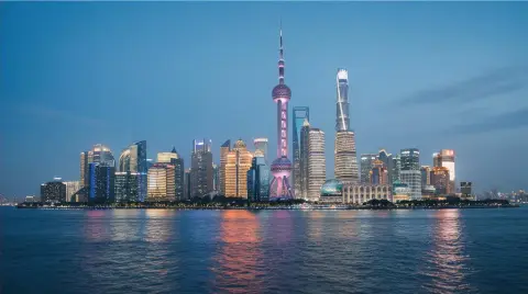 Shanghai Bund skyline at blue hour, cinematic street photography