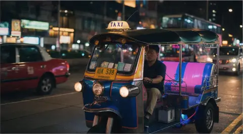 A Bangkok tuk-tuk at night, cinematic street photography